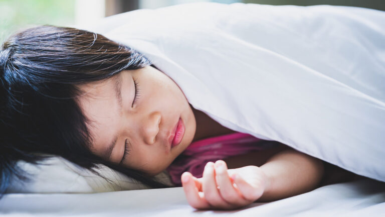 kid grind teeth while sleeping